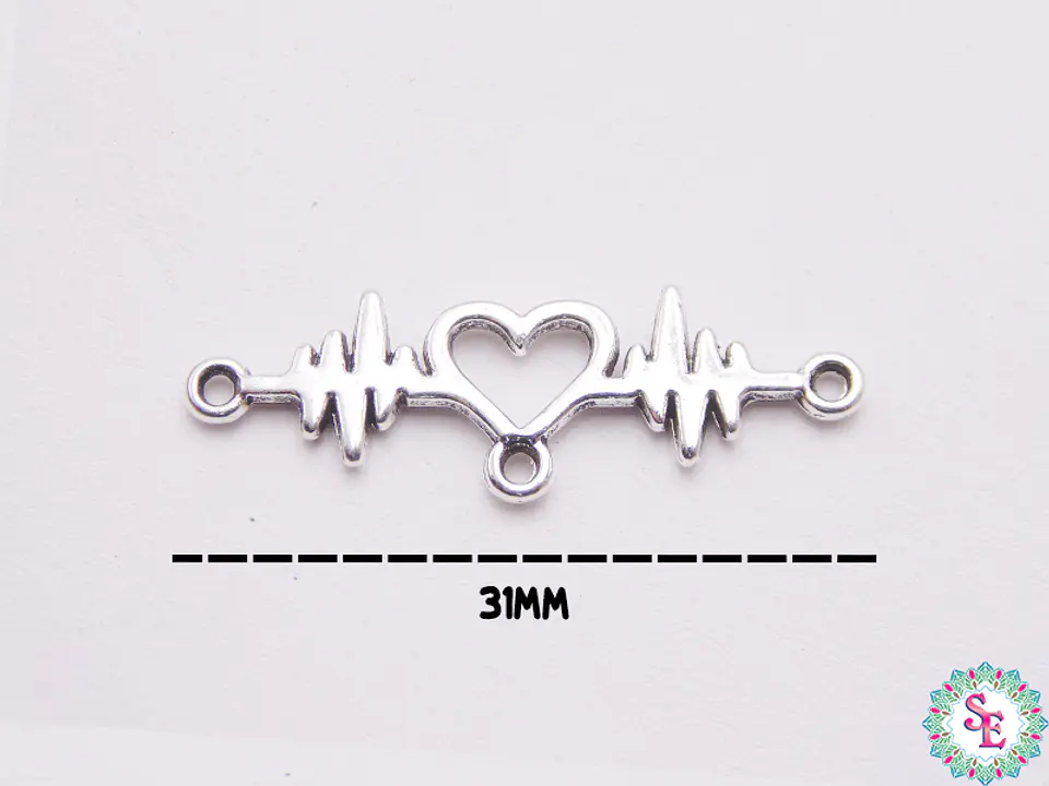 SAMAK PLATEADA CENTRO 47 CORAZON SIGNO VIDA 31MM PAQUETE POR 18 UNIDADES APROX 1