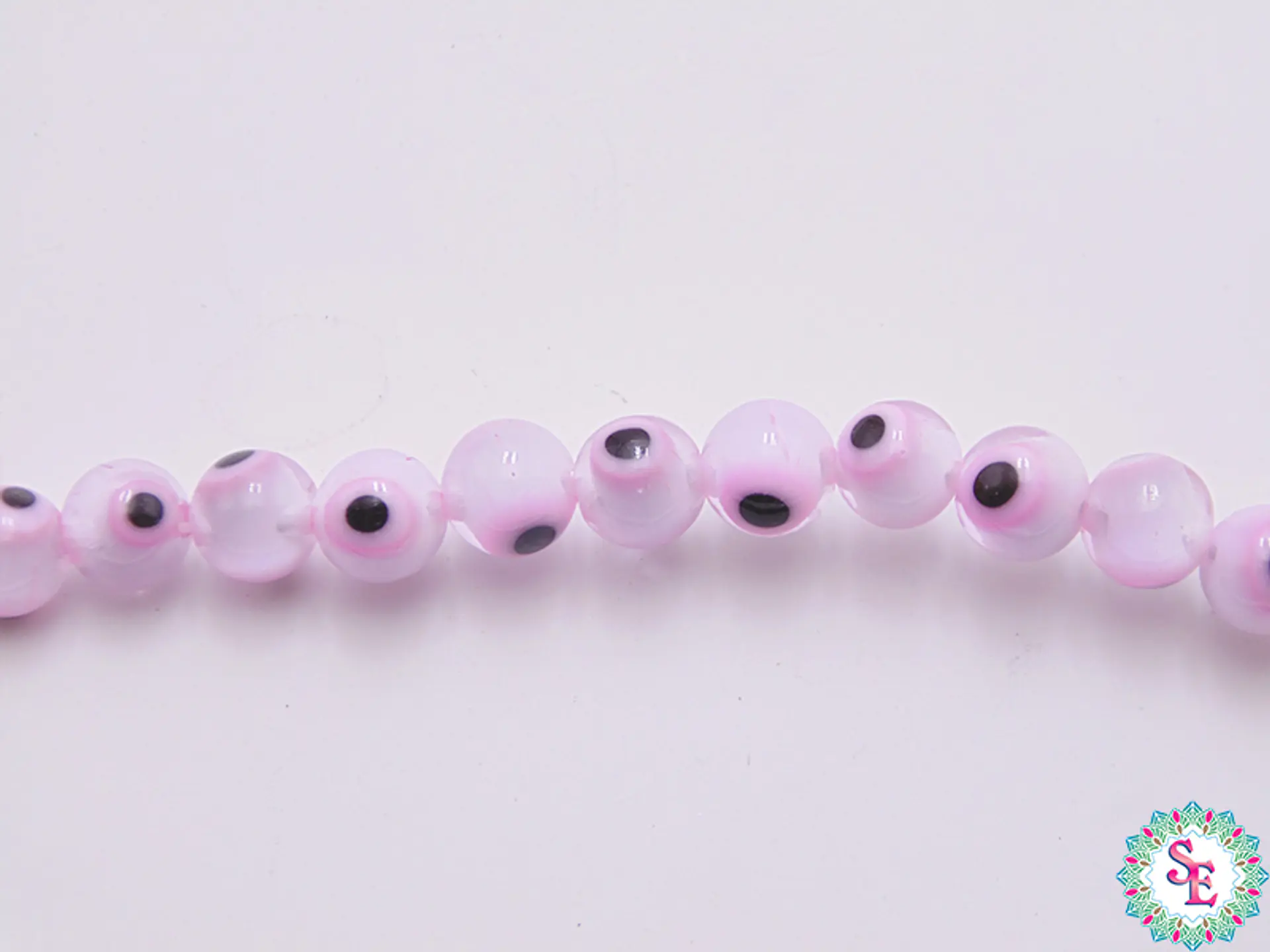  OJO TURCO REDONDO # 6MM ROSADO FUERTE  1