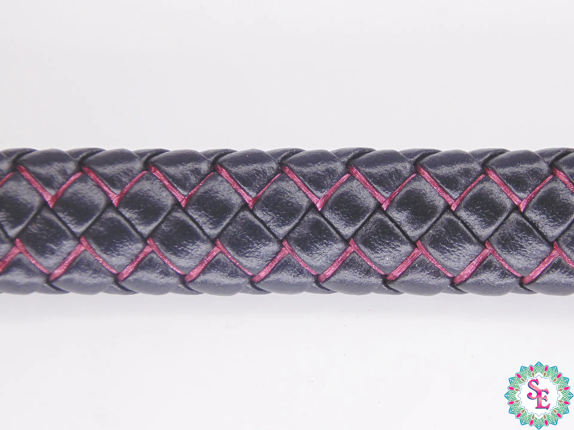 CUERO DE VACA TRENZADO 12*6MM NEGRO FUCSIA X 50CM 2