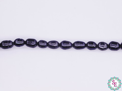 PERLA DE RIO 4*5MM NEGRA OVALADA