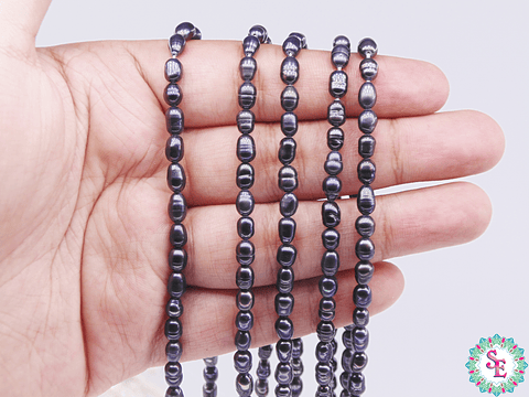 PERLA DE RIO 4*5MM NEGRA OVALADA