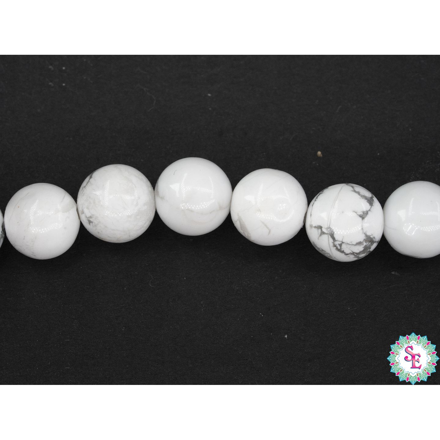 SARTA DE PIEDRA NATURAL LISA # 8MM HOWLITA  1