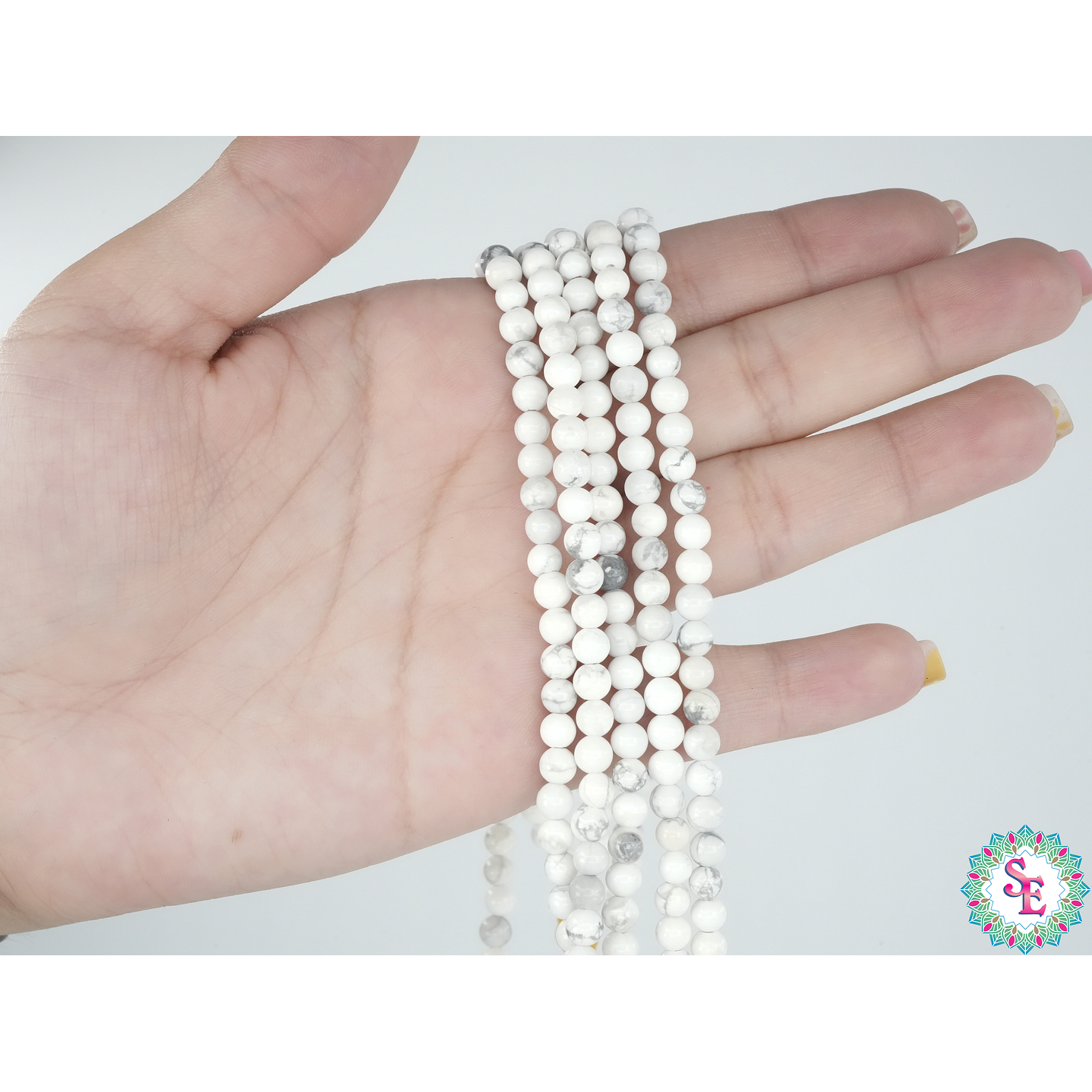 SARTA DE PIEDRA NATURAL LISA 4MM HOWLITA  2