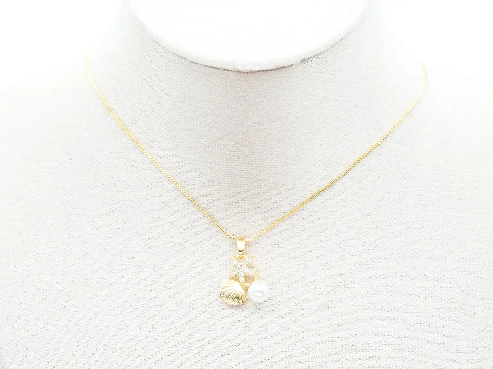 RODIO DORADO DIJE PERLA CONCHA ESTRELLA MAR ZIRCON 14MM 2