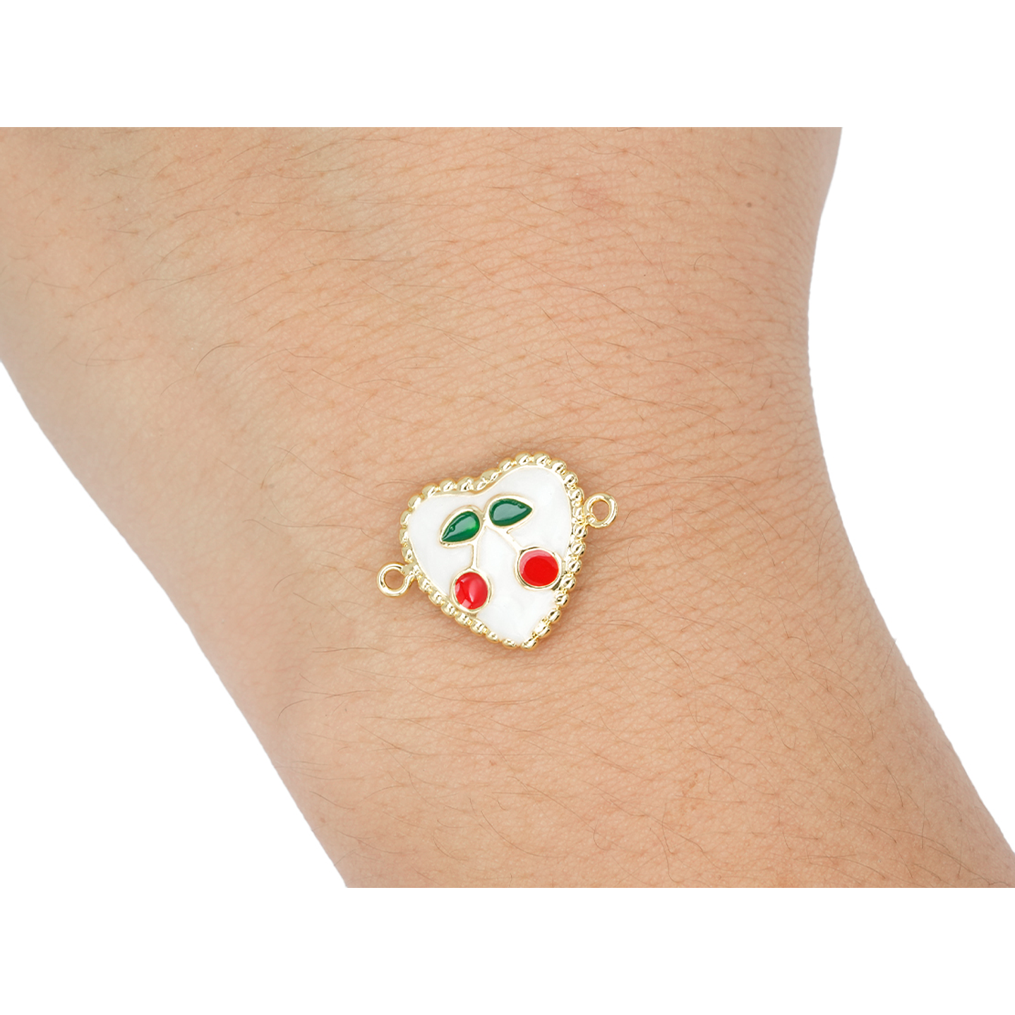 RODIO DORADO CENTRO CORAZON BLANCO CEREZA 14*15MM 2