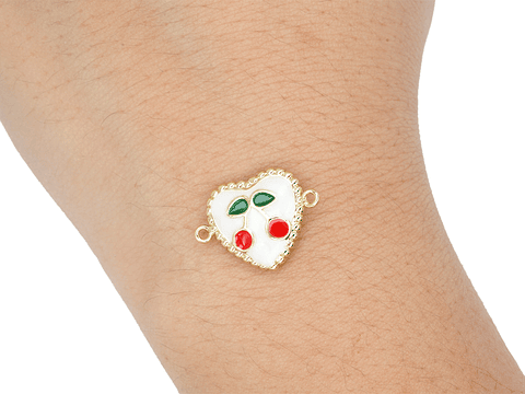 RODIO DORADO CENTRO CORAZON BLANCO CEREZA 14*15MM