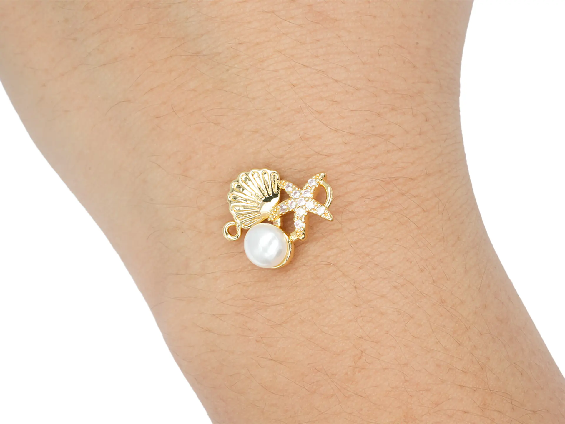 RODIO DORADO CENTRO PERLA CONCHA ESTRELLA MAR ZIRCON 14MM 2