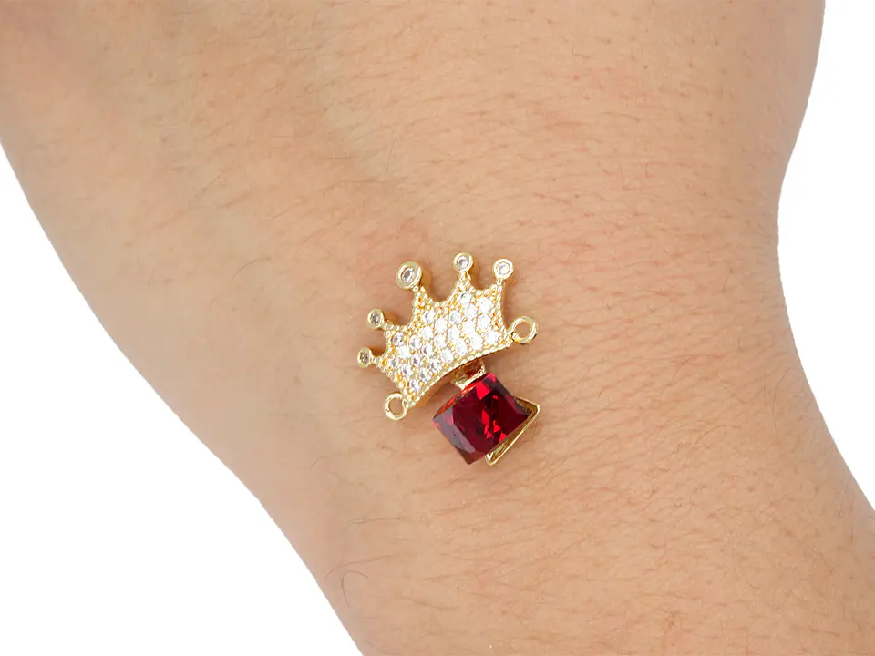 RODIO DORADO CENTRO CORONA CUBO ROJO ZIRCON 17*21MM 2