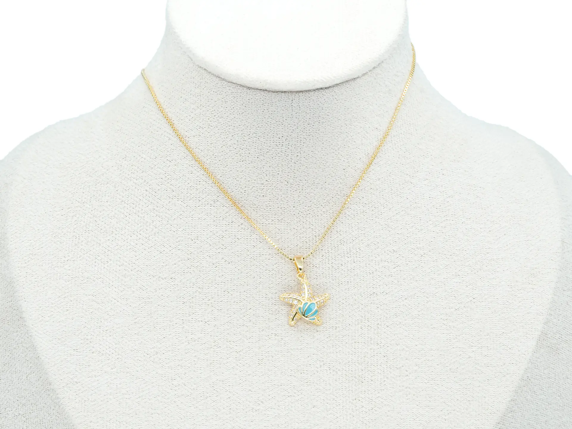 RODIO DORADO DIJE ESTRELLA MAR CONCHA AZUL ZIRCON 16*14MM 2