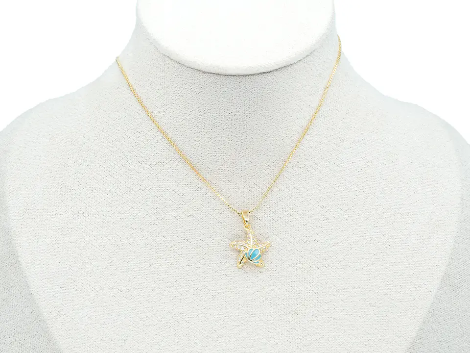 RODIO DORADO DIJE ESTRELLA MAR CONCHA AZUL ZIRCON 16*14MM 2
