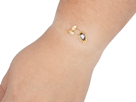 RODIO DORADO CENTRO TULIPAN MORADO ZIRCON 27*11MM