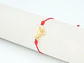 PULSERA DORADA ACERO CENTRO HILO 227 - Miniatura 1