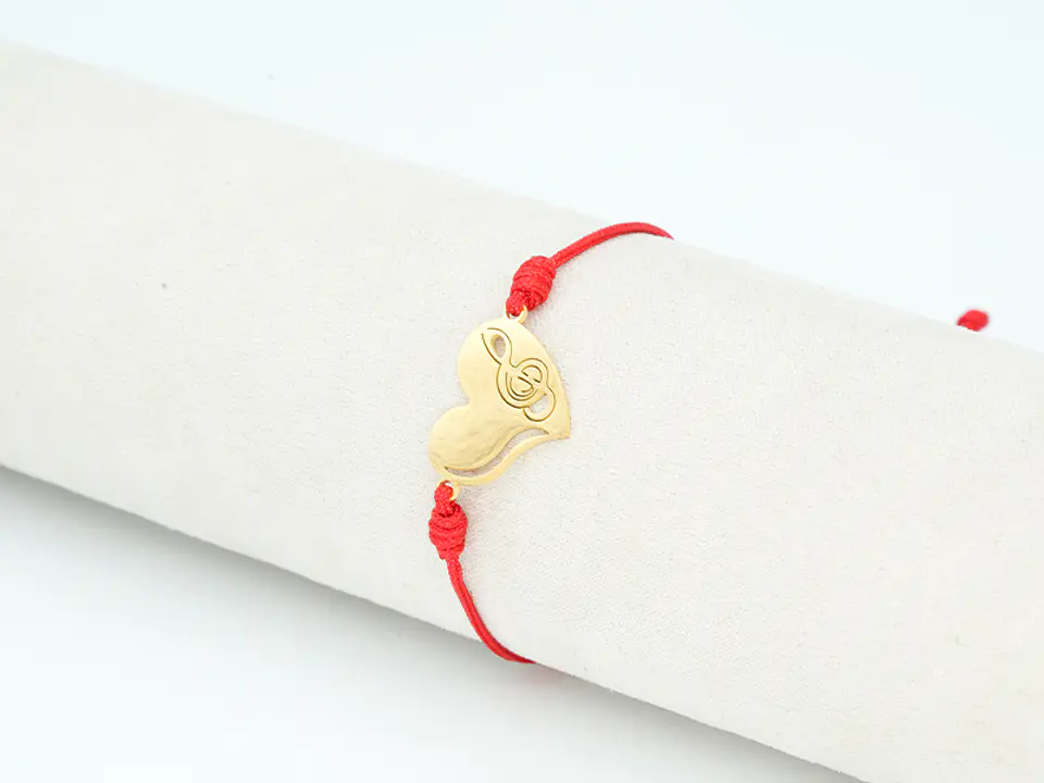 PULSERA DORADA ACERO CENTRO HILO 227 1