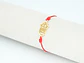 PULSERA DORADA ACERO CENTRO HILO 10 - Miniatura 1
