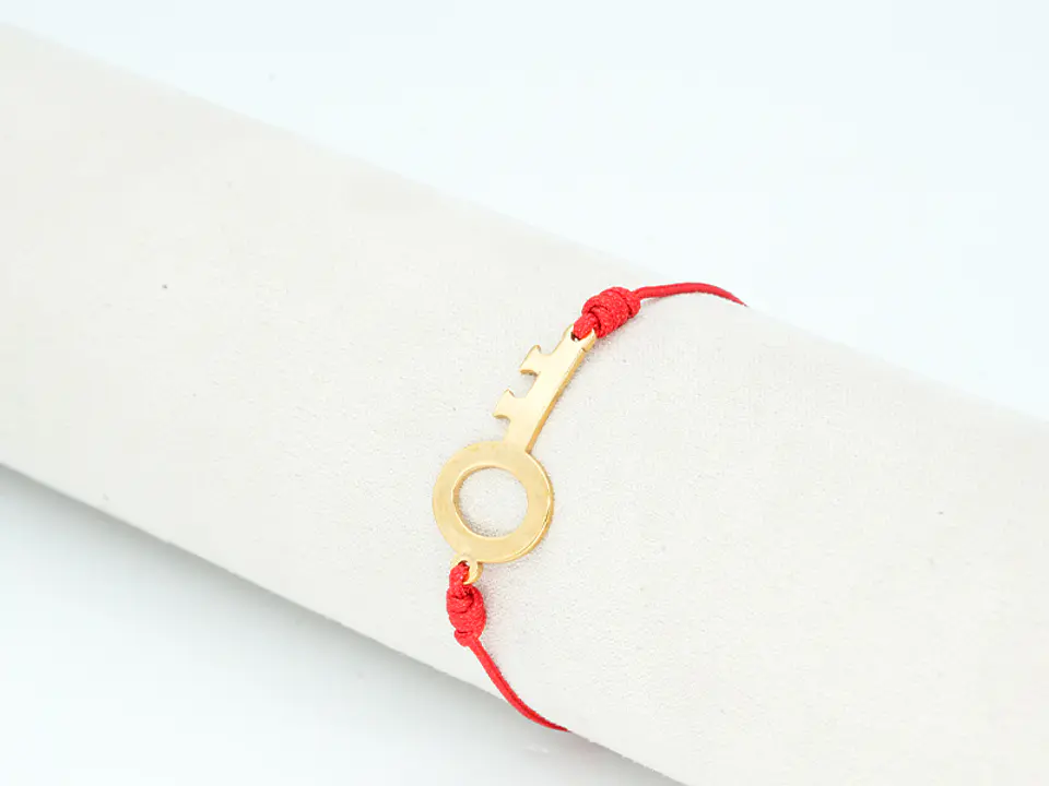 PULSERA DORADA ACERO CENTRO HILO 10 1
