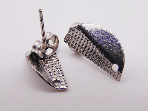 TOPO ACERO TOPO 25  GRABADO DOBLADO 15*7MM  X PAR