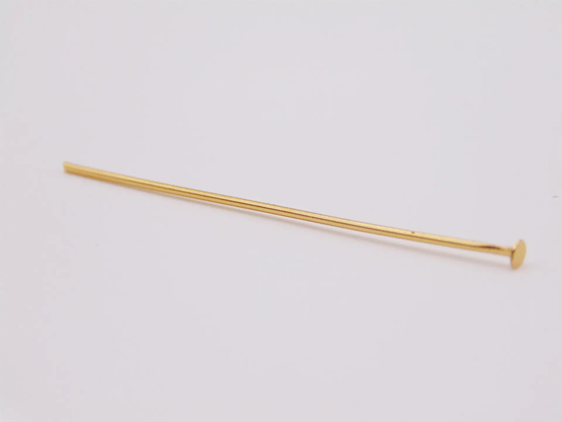 ALFILER ACERO DORADO CABEZA PLANA 0.7*35MM  1