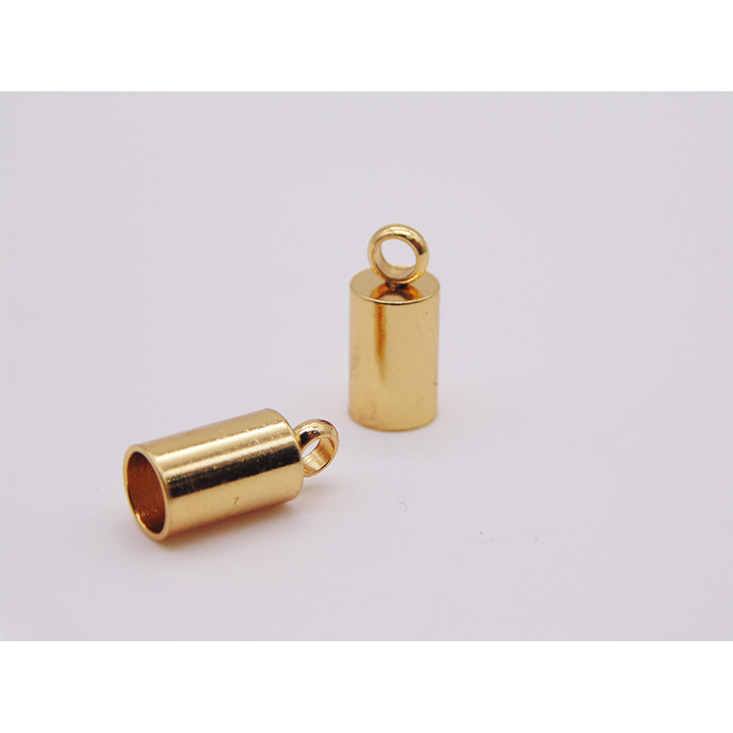 TERMINAL CAMPANA LISA ACERO DORADO 4MM 1