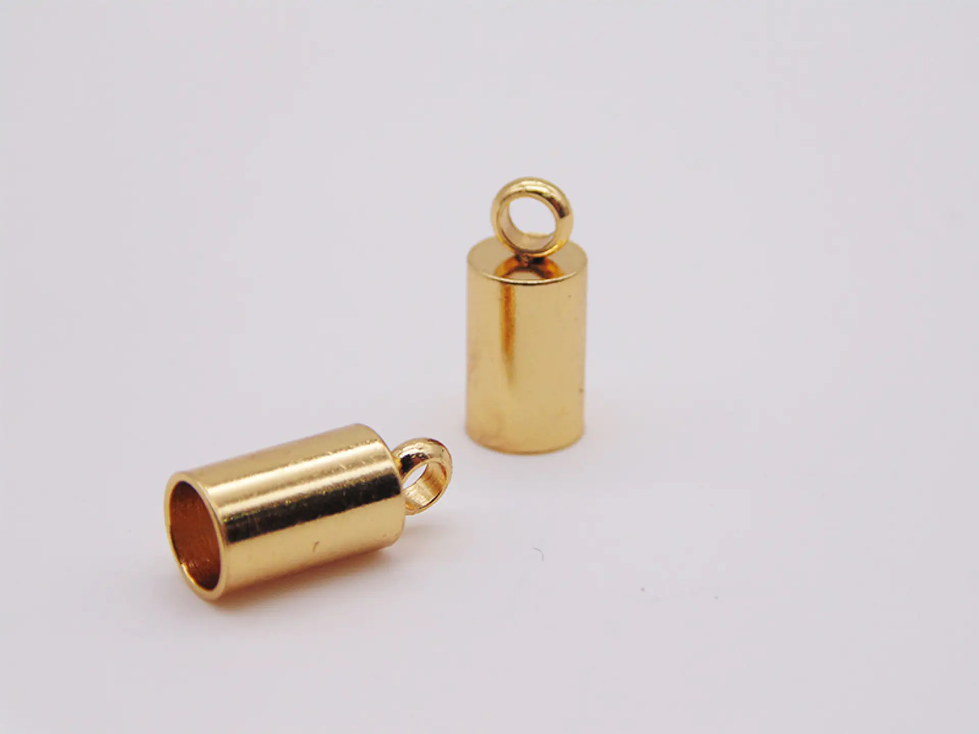 TERMINAL CAMPANA LISA ACERO DORADO 4MM 1