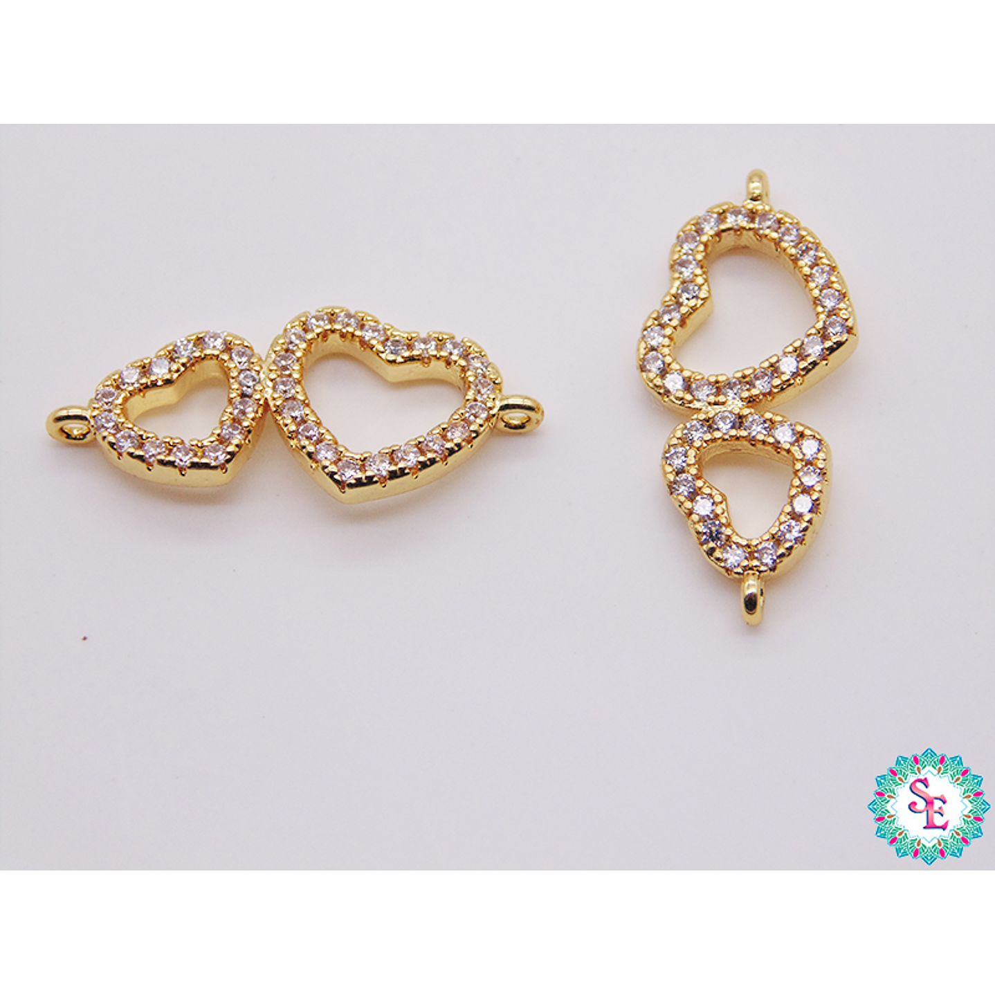 RODIO DORADO CORAZON DOBLE PQ CIRCON BLANCO 21*9MM 1