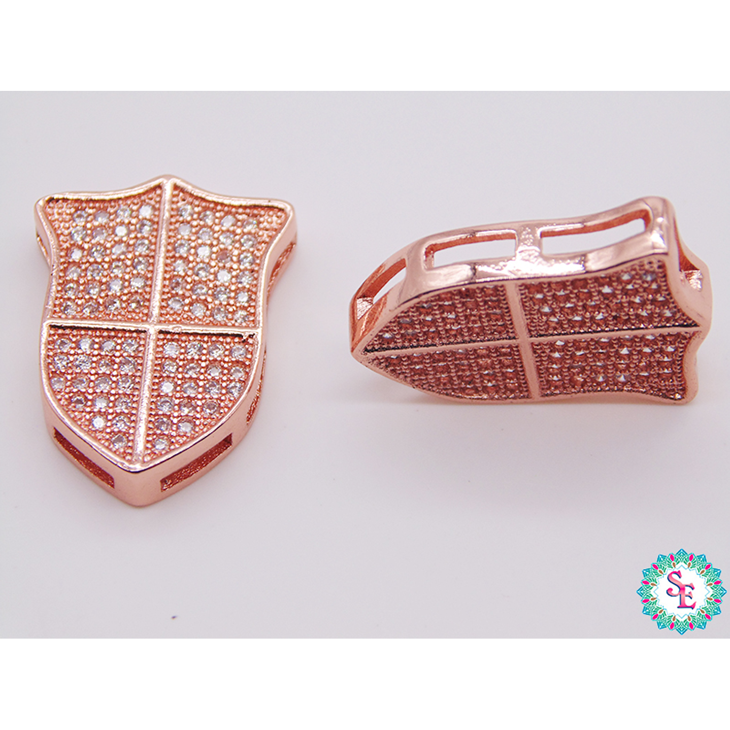 RODIO ESCUDO ROSADO  CIRCON PLATEADO 15*20MM 1