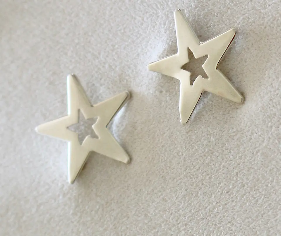 Aros bañados en plata Estrella Calada. 1