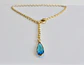 Collar bañado en oro con Calcedonia Celeste. - Miniatura 1