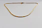 Collar bañado en oro con Mostacillas. - Miniatura 1