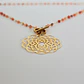 Collar bañado en oro con Agatas terracota y Mandala calada. - Miniatura 1
