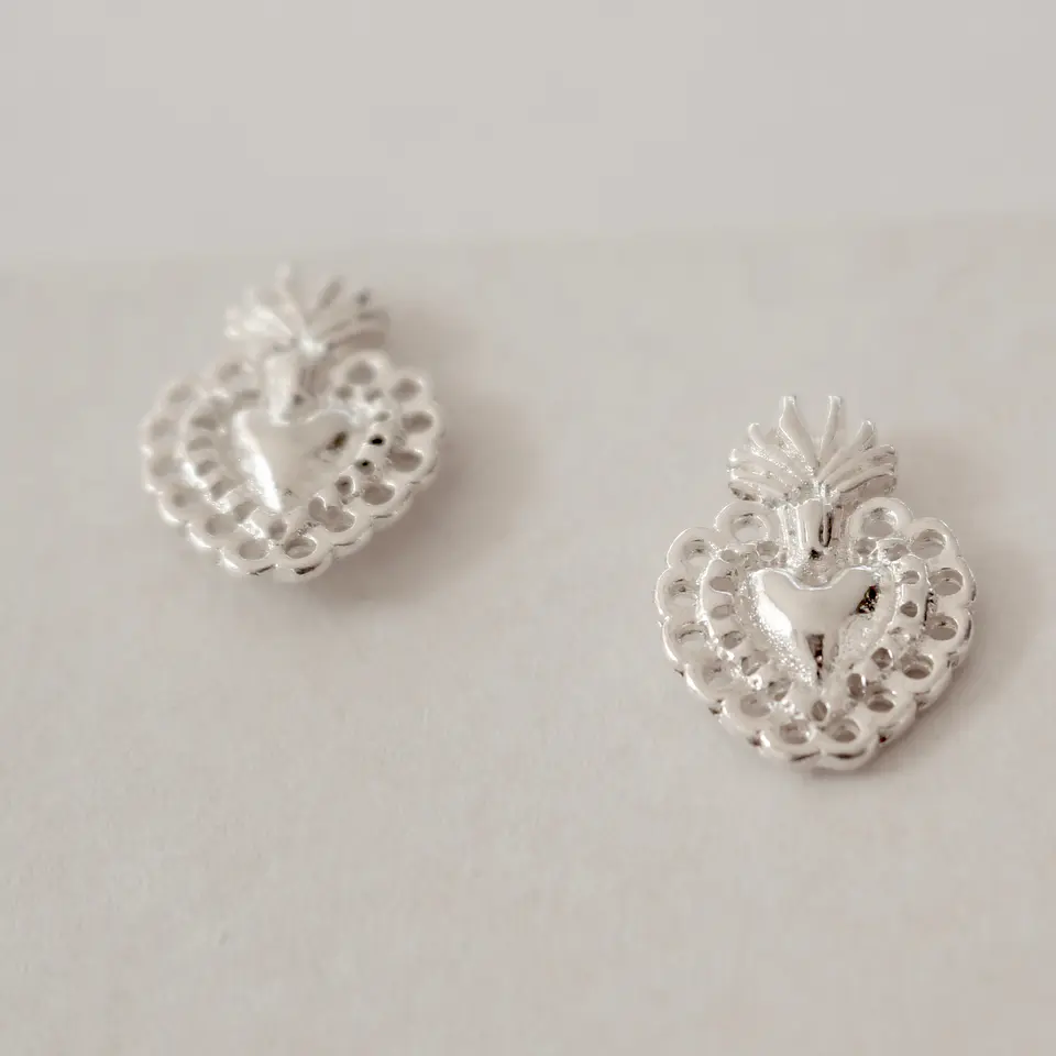 Aros bañados en plata Corazón Detente. 1