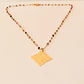 Collar bañado en oro con Turmalinas y Medallón. - Miniatura 1