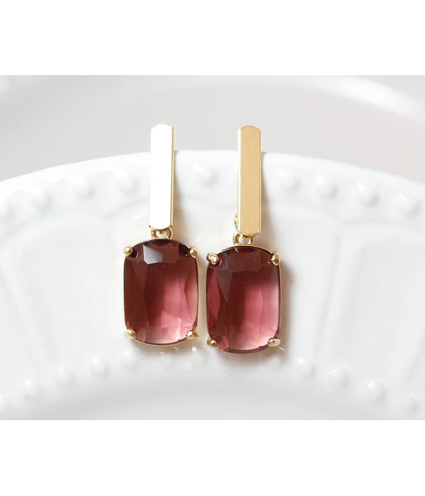 Aros bañados en oro con Cristal burdeo.