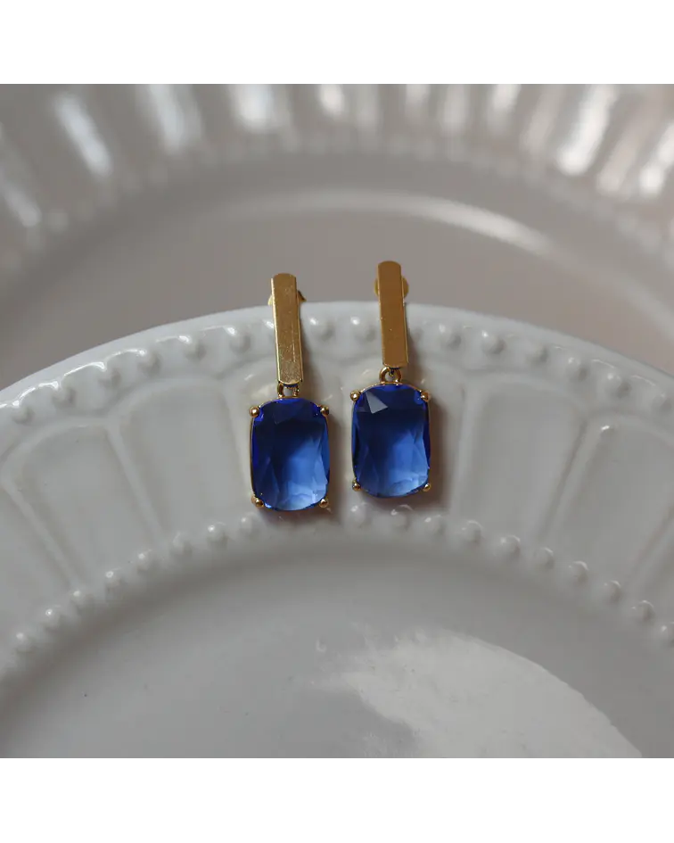 Aros bañados en oro con Cristal azul.
