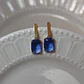 Aros bañados en oro con Cristal azul. - Miniatura 2