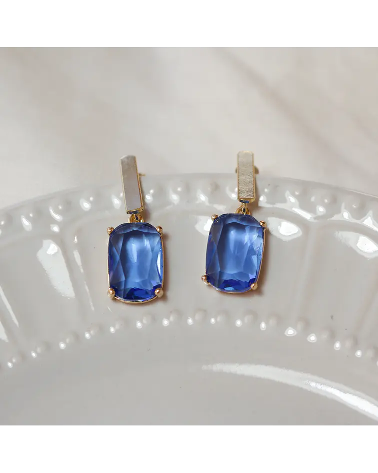 Aros bañados en oro con Cristal azul.