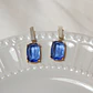 Aros bañados en oro con Cristal azul. - Miniatura 1