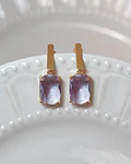 Aros bañados en oro con Cristal lila.