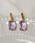 Aros bañados en oro con Cristal lila.