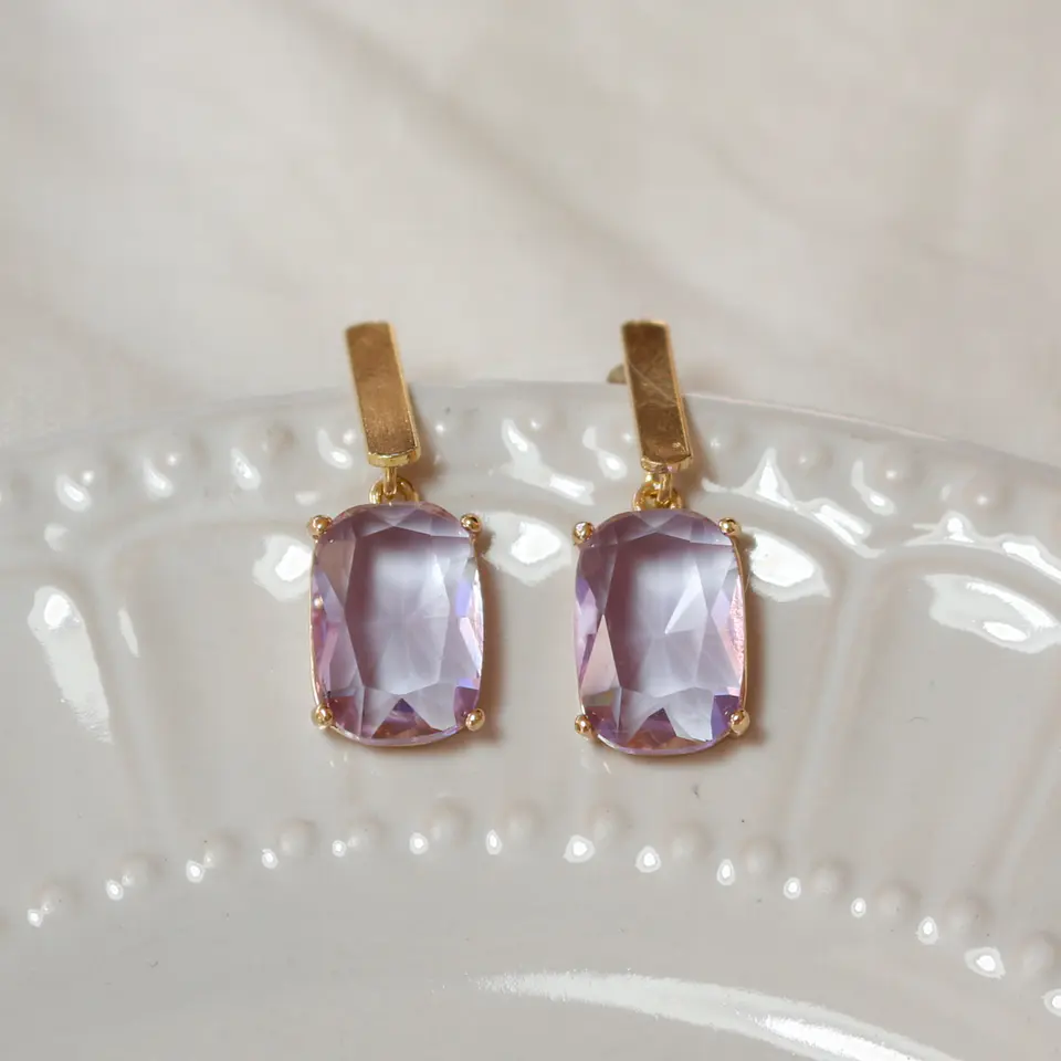 Aros bañados en oro con Cristal lila. 2