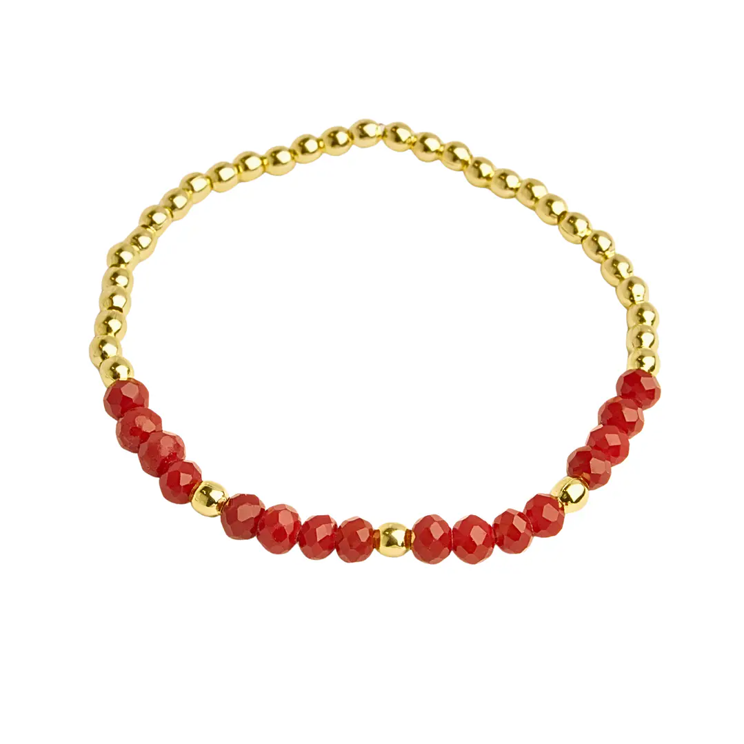 Pulsera elástica con balines enchapados en oro y cristales rojos 1