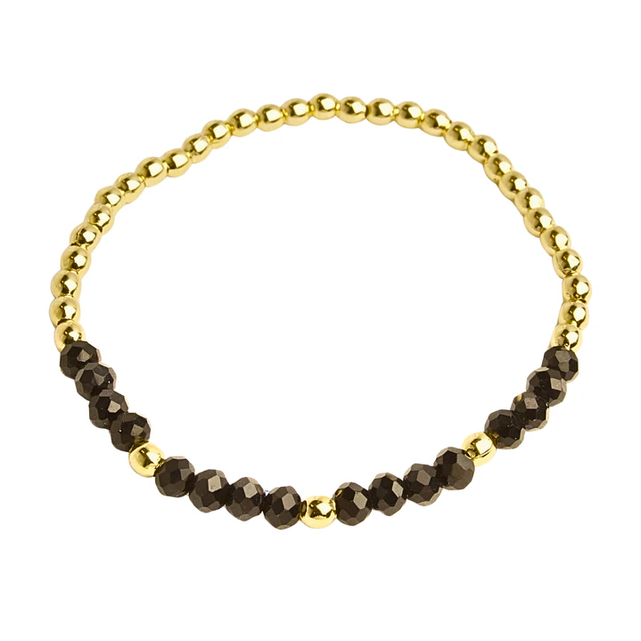 Pulsera elástica con balines enchapados en oro y cristales negros 1