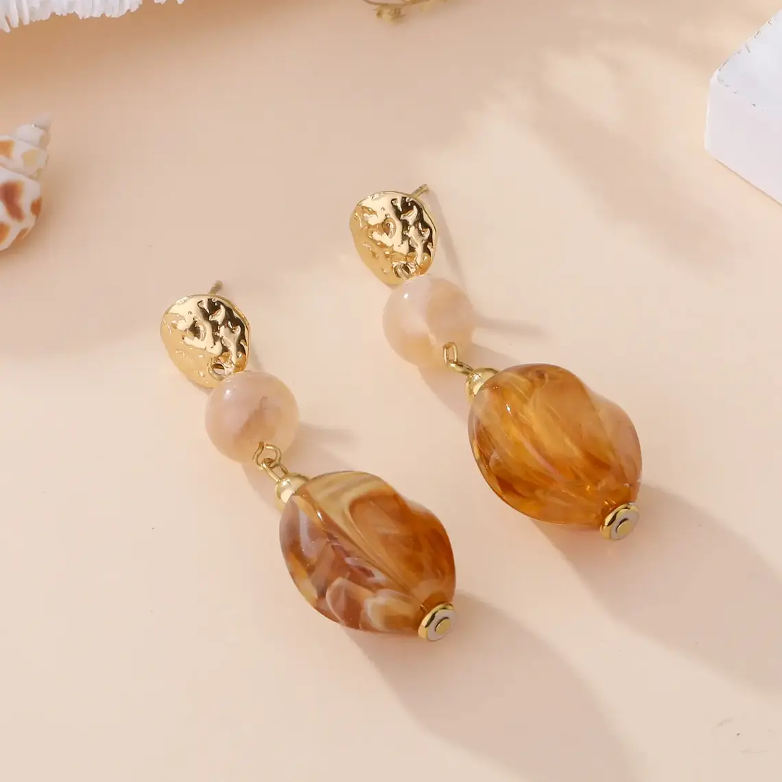 Brincos LUMIÈRE Âmbar Dourado – Aço Inox 1