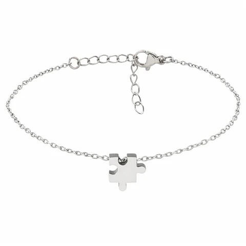 Pulsera personalizada mujer, pieza de puzzle grabada con inicial en acero inoxisable color plata