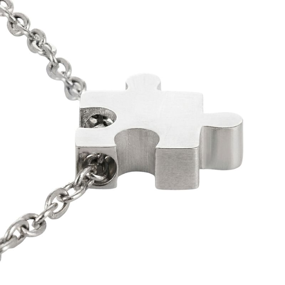 Pulsera personalizada mujer, pieza de puzzle grabada con inicial en acero inoxisable color plata 3