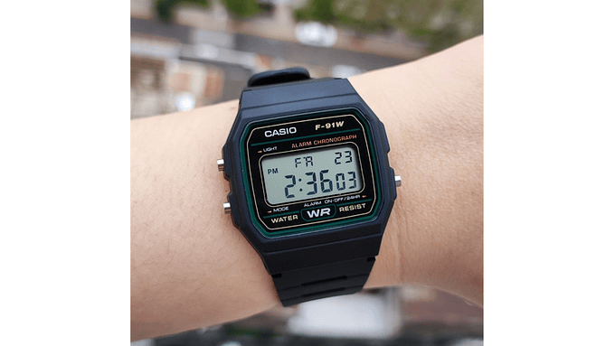 Reloj De Pulsera Casio Collection F-91w-3dg De Cuerpo Color Negro, Digital, Para Hombre, Fondo Gris, Con Correa De Resina Color Negro, Dial Negro, Bisel Color Verde Y Hebilla Sim 4