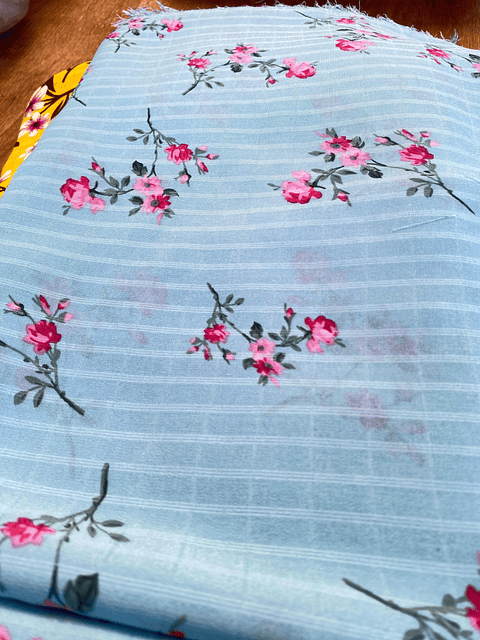 Gasa Chiffon Celeste Floreado