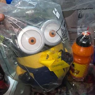 palomera oficial de Minion en overol clásico