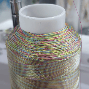 Hilo matizado arcoiris claro 5.000 yrs.