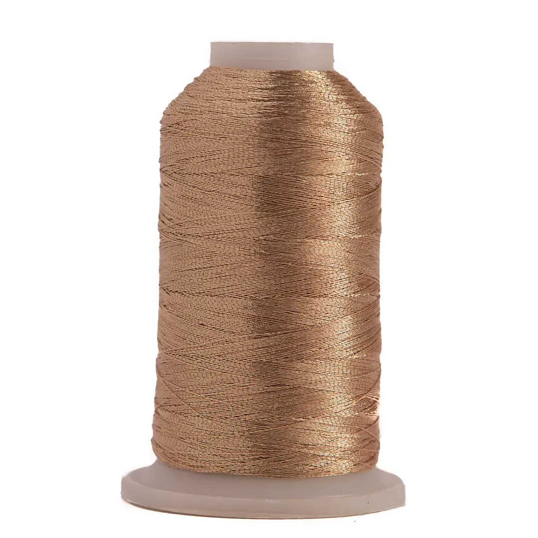 Hilo de bordar metalizado oro texsur 1000 mts. 1