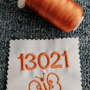 13021 hilo bordar naranja 1000 mts.